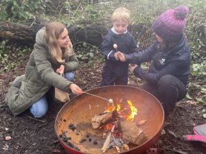 Mum and little boy enjoying Nursery Forest School